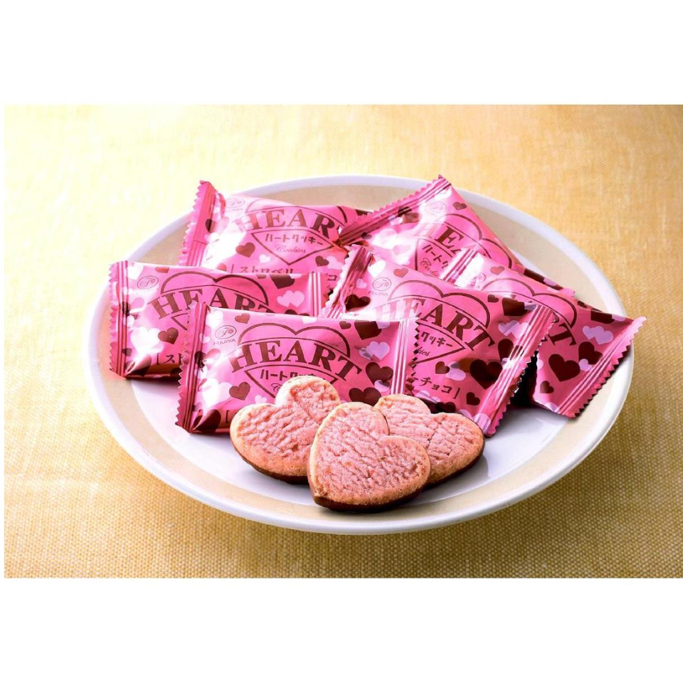 Heart-shaped cookies with a pinkish tint and a strawberry flavor.