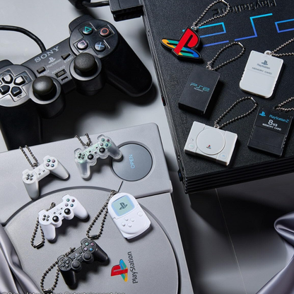 PlayStation™/ميدالية صغيرة مع بسكويت